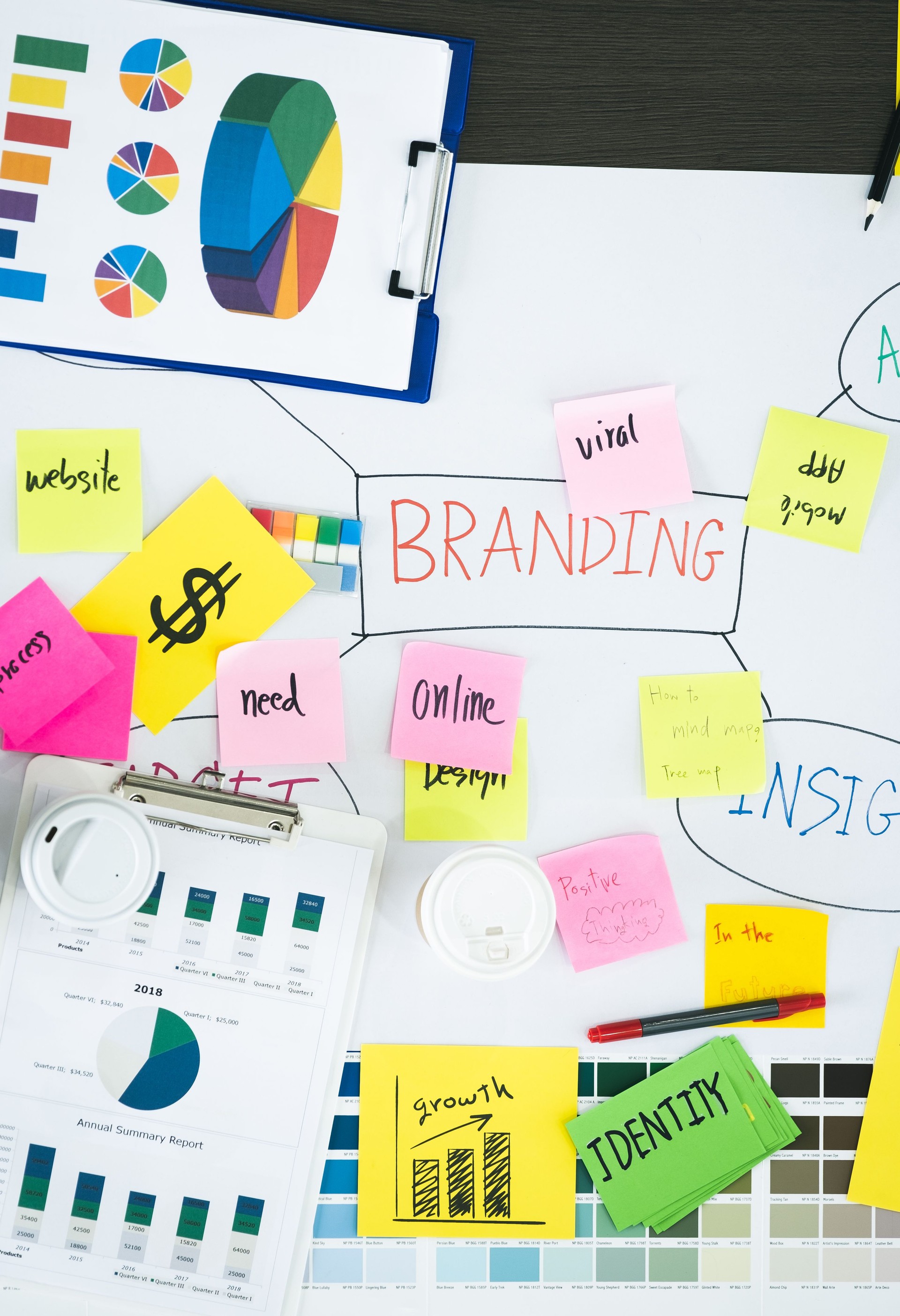 Top view of creative designer brainstorming document on wood table in meeting room